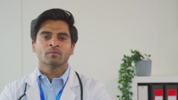 Portrait Serious Male Doctor Stethoscope Wearing White Coat Standing Office — Stock Video