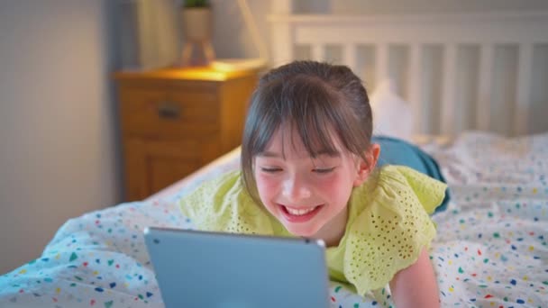 Girl Bedroom Lying Bed Streaming Music Watching Movie Digital Tablet — Stock Video