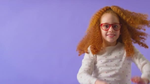 Studio Shot Red Haired Young Girl Wearing Red Spectacles Dancing — Stock Video