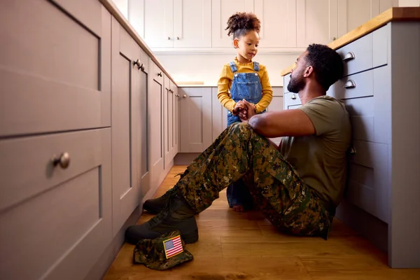 Daughter Comforting Depressed Father Uniform Suffering Ptsd Sitting Floor Home — Φωτογραφία Αρχείου