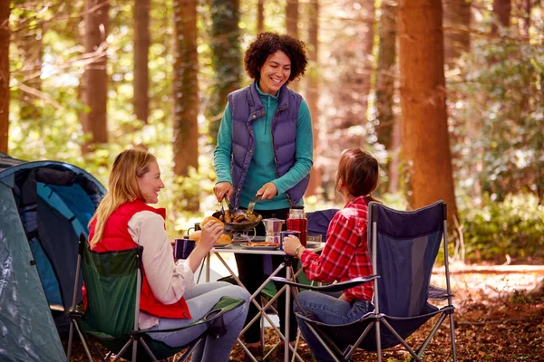 Group Female Friends Camping Holiday Forest Eating Meal Sitting Tent — Stock fotografie