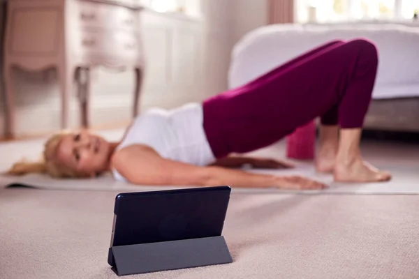 Active Mature Woman Digital Tablet Doing Online Yoga Class Mat — Foto Stock