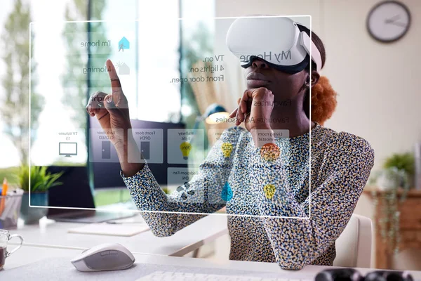 Woman Looking Projected Screen Smart Home Sitting Desk Wearing Headset — Φωτογραφία Αρχείου