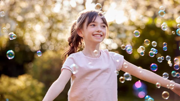 Smiling Girl Outdoors Having Fun Playing Bubbles Garden — Stock Photo, Image
