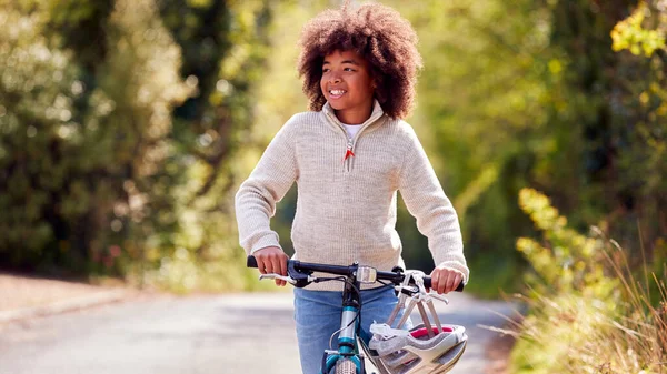 Smiling Boy Safety Helmet Pushing Bike Country Road — Stockfoto