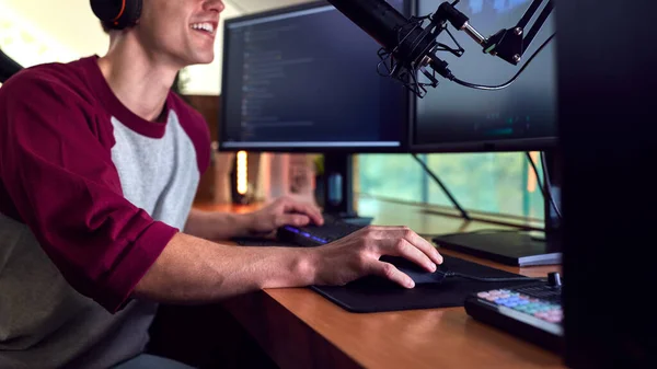 Close Man Gaming Home Wearing Wireless Headphones Sitting Desk Multiple — Stockfoto