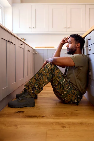 Depressed Male Soldier Uniform Suffering Ptsd Sitting Kitchen Floor Home — Stock Photo, Image