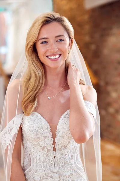 Smiling Bride Bridal Store Trying Wedding Dress — Stockfoto