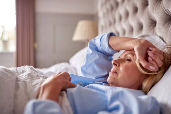Menopausal Mature Woman Suffering Insomnia Bed Home — Zdjęcie stockowe