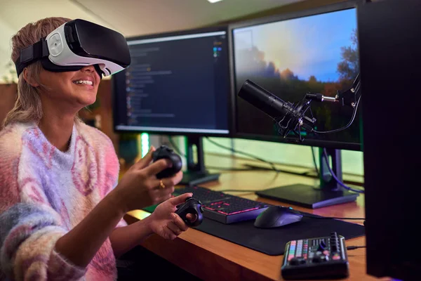 Woman Wearing Virtual Reality Headset Gaming Home Sitting Desk Multiple — Stock Photo, Image