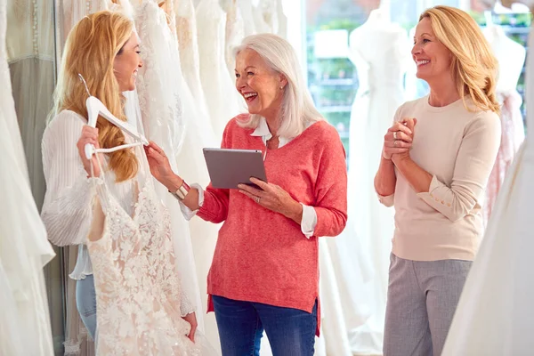 Sales Assistant Mother Helping Adult Daughter Choose Wedding Dress Bridal — Foto Stock