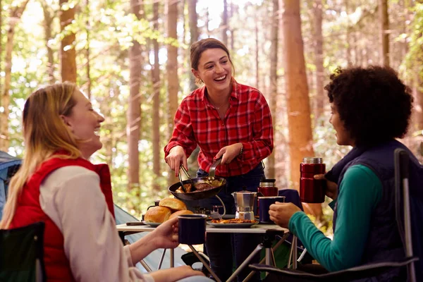 Group Female Friends Camping Holiday Forest Eating Meal Sitting Tent — Stockfoto