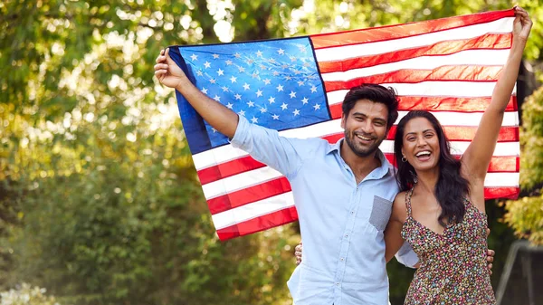 Portrait Patriotic American Couple Holding Usa Stars Stripes Flag Outdoors — Stockfoto