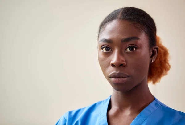 Portrait Serious Female Nurse Doctor Wearing Scrubs Stock Image