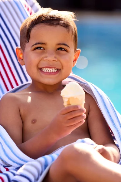 Boy Summer Holiday Lounger Swimming Pool Eating Ice Cream — 스톡 사진