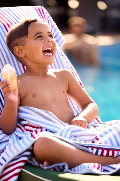 Boy Summer Holiday Lounger Swimming Pool Eating Ice Cream — 스톡 사진