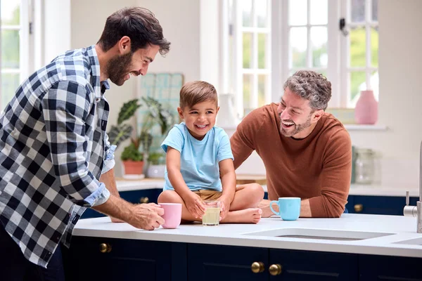 Same Sex Family Two Dads Kitchen Son Sitting Counter — Stock Photo, Image