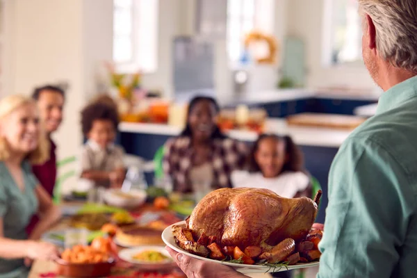 Grandfather Serving Multi Generation Family Celebrating Thanksgiving Home Eating Meal — Stock Photo, Image