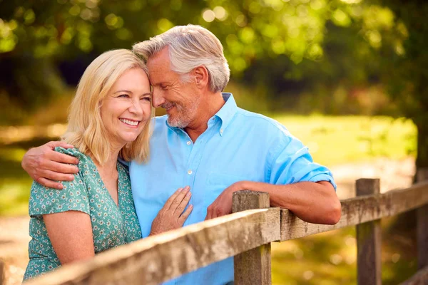 Loving Casually Dressed Mature Senior Couple Leaning Fence Walk Countryside — Stock Photo, Image