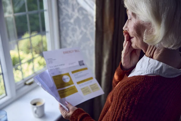 Worried Senior Woman Opening Energy Bill Concerned Cost Living Energy — Stock Photo, Image