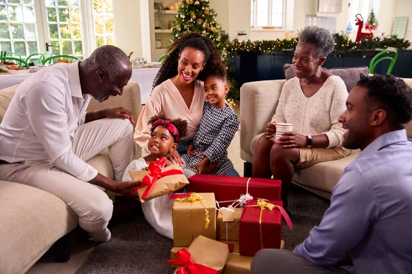 Multi Generation Family Celebrating Christmas Home Opening Presents Together — Stock Photo, Image