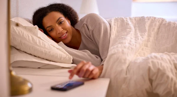 Woman Home Bed Turning Alarm Mobile Phone — Stock Photo, Image