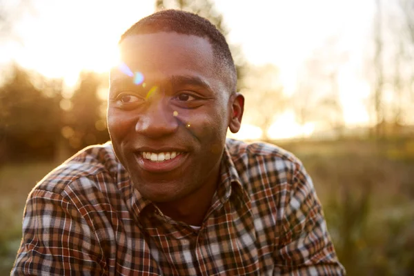 Head Shoulders Portrait Smiling Man Outdoors Countryside Flaring Evening Sun — Stock Photo, Image
