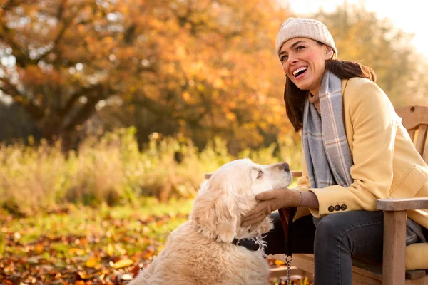 Woman Wearing Hat Scarf Sitting Bench Pet Dog Walk Autumn — Stock Photo, Image