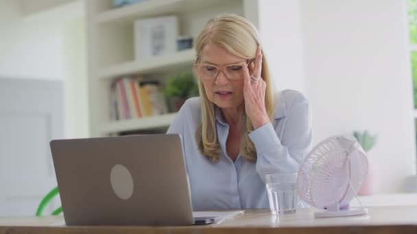 Menopausal Mature Woman Wearing Glasses Working Laptop Suffering Headache Drinking — Stock Video