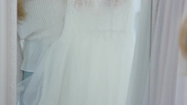 Woman Choosing Wedding Dress Bridal Store Looking Reflection Mirror Shot — Stock Video