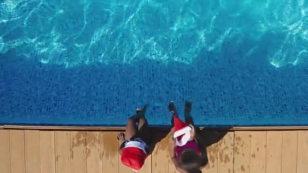 Drone Shot Multi Generation Family Christmas Holidays Sitting Swimming Pool — Stock Video