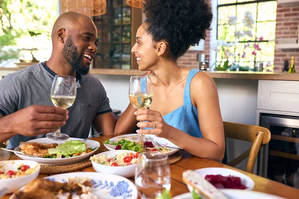 Couple Sitting Table Home Doing Cheers Wine Meal — Stock Photo, Image