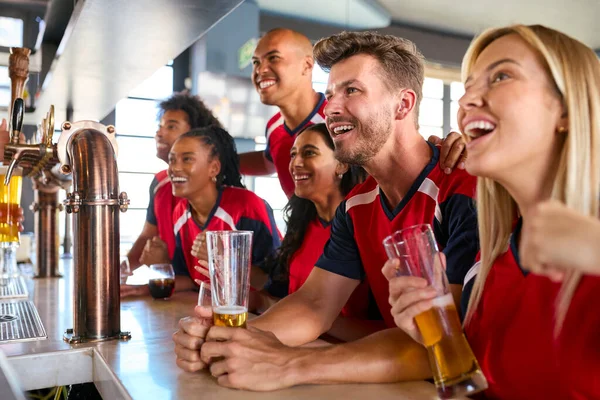 Multi Cultural Group Friends Wearing Team Shirts Sports Bar Celebrating — Stock Photo, Image