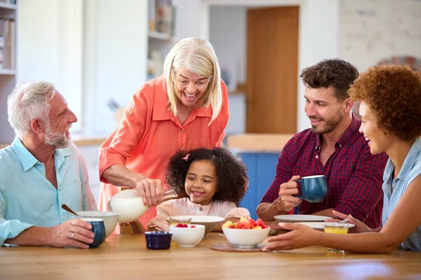 Multi Generation Family Home Enjoying Breakfast Together — Stock Photo, Image