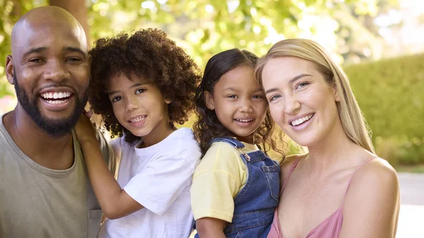 Portrait Multi Racial Family Standing Garden Smiling Camera — Stock Photo, Image