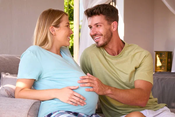 Couple Pregnant Woman Bedroom Home Man Feeling Baby Kicking — Stock Photo, Image