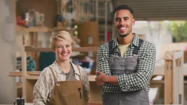 Portrait Smiling Male Female Apprentice Carpenters Working Furniture Workshop Shot — Stock Video