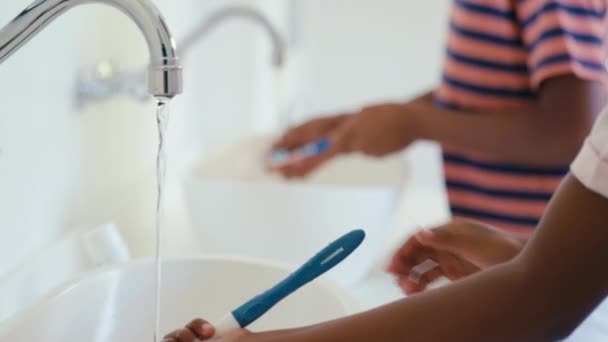 Brother Sister Home Bathroom Brushing Teeth Manual Toothbrush Shot Slow — Stock Video