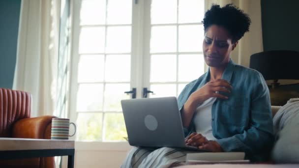 Menopausal Mature Woman Home Laptop Having Hot Flush Fanning Herself — Stock Video