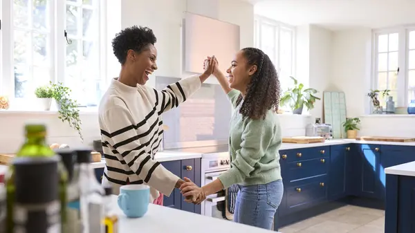 Mother Teenage Daughter Having Fun Dancing Kitchen Home Together — Stock Photo, Image