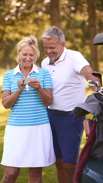 Senior Couple Standing Next Buggy Golf Course Marking Score Card — Stock Photo, Image