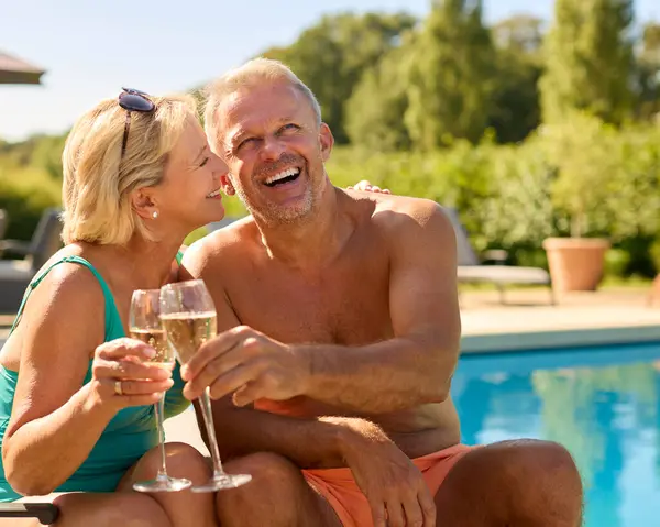 Portrait Senior Couple Holiday Swimming Costumes Drinking Champagne Hotel Swimming — Stock Photo, Image