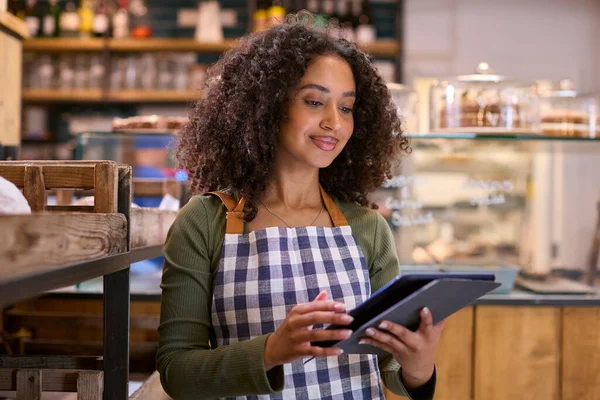 Smiling Young Woman Wearing Apron Working Food Shop Using Digital — Stock Photo, Image