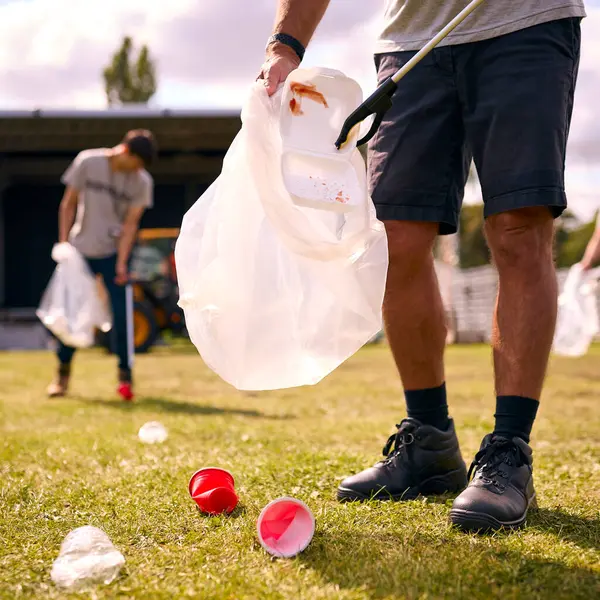 Close Volunteers Picking Litter Outdoor Event Concert Music Festival — Stock Photo, Image