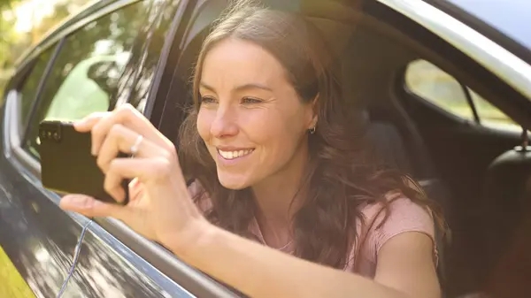 Woman Car Road Trip Vacation Taking Picture Mobile Phone — Stock Photo, Image