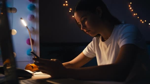 Teenage Girl Sitting Desk Bedroom Home Messaging Mobile Phone Night — Stock Video