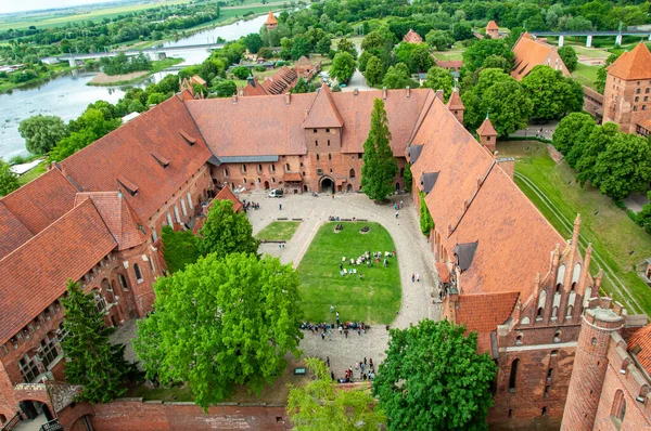 View from the castle tower. The Castle of the Teutonic Order in Malbork by the Nogat river. Poland.