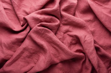 Dikiş konsepti: koyu pembe keten kumaş.