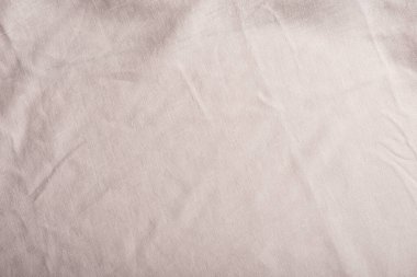 Terzi dükkânı konsepti: açık pembe keten kumaş