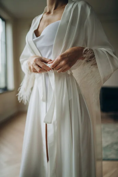 Close Photo Bride Silk Dressing Gown Holding Wedding Dress Infront — 스톡 사진